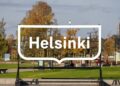 Captivating autumn scene in Helsinki park with vibrant foliage and clear skies.
